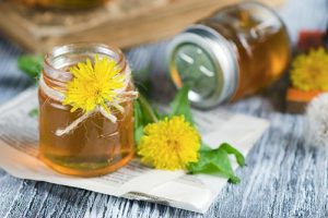 St johns wort herbs flowers laying in a jar with tea mix 
