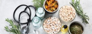 Alternative medicine herbs and homeopathic globules. Homeopathy medicine concept. Panorama, banner