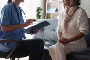 A nurse consulting with a patient