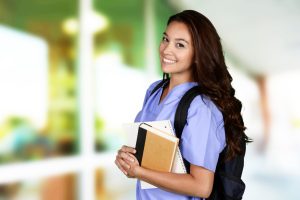 Female nurse who is studying for her job