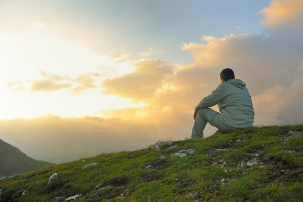 healthy young man practice yoga in height mountain at early morning and sunrise