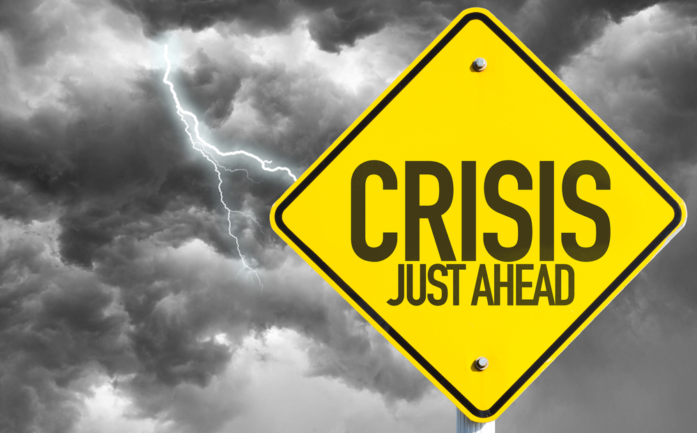 Crisis just ahead on a warning sign