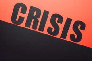 The word Crisis in bold lettering showing the need for Crisis Intervention Counseling
