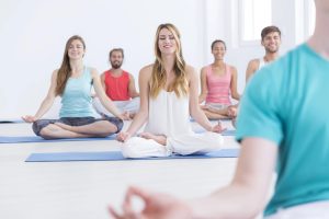 A certified meditation instructor leading her group. 