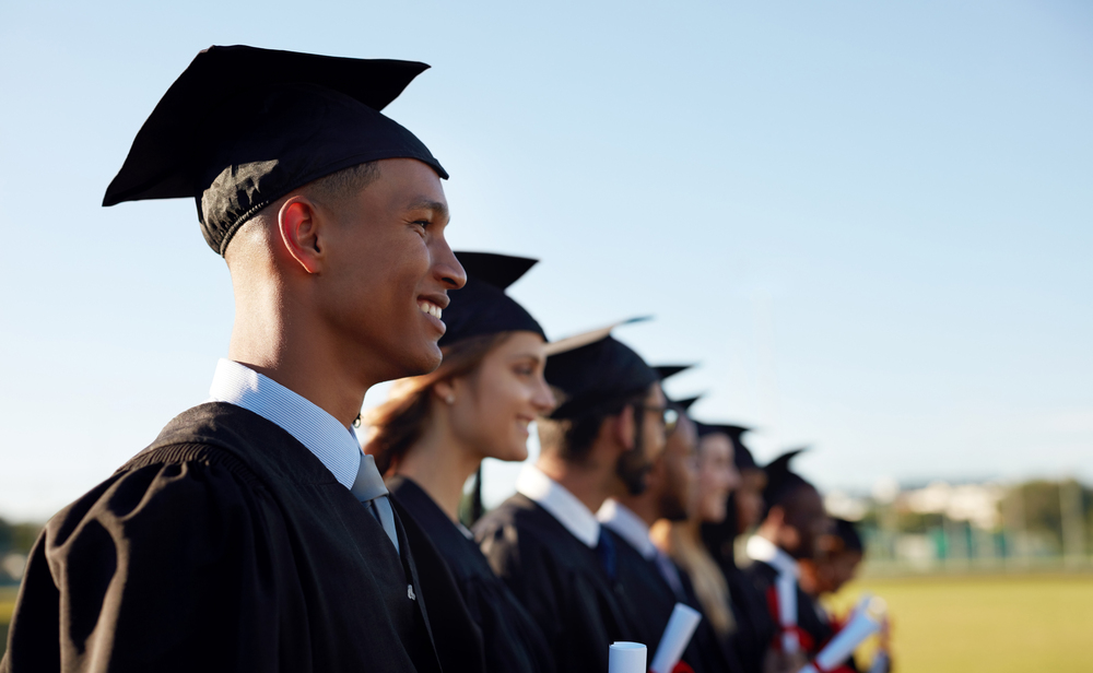 What a thrilling moment for all. a group of university students standing in line on graduation day