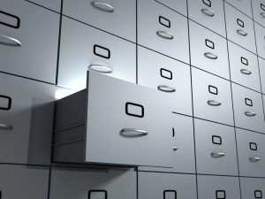 A large wall of filing cabinets. Something case managers are all to familiar with.