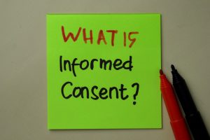 Health Care Ethics: A sticky note that says "What is Informed Consent?"