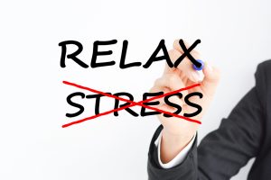 A cartoon where the word "stress" is X'ed out and "Relax" is in it's place. 