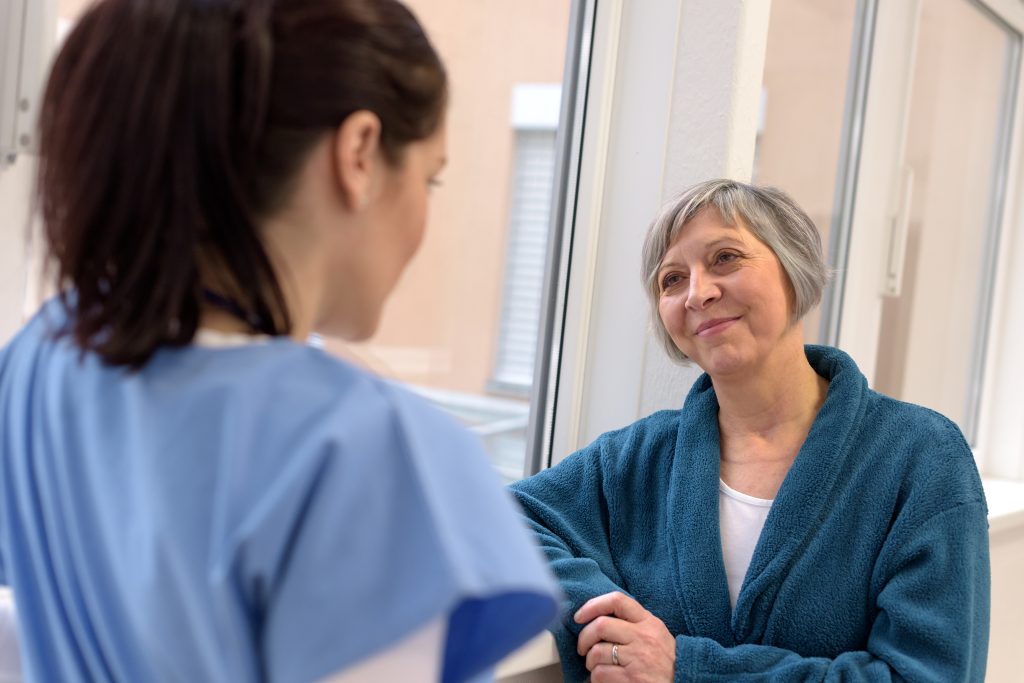 Nurse working with a senior patient