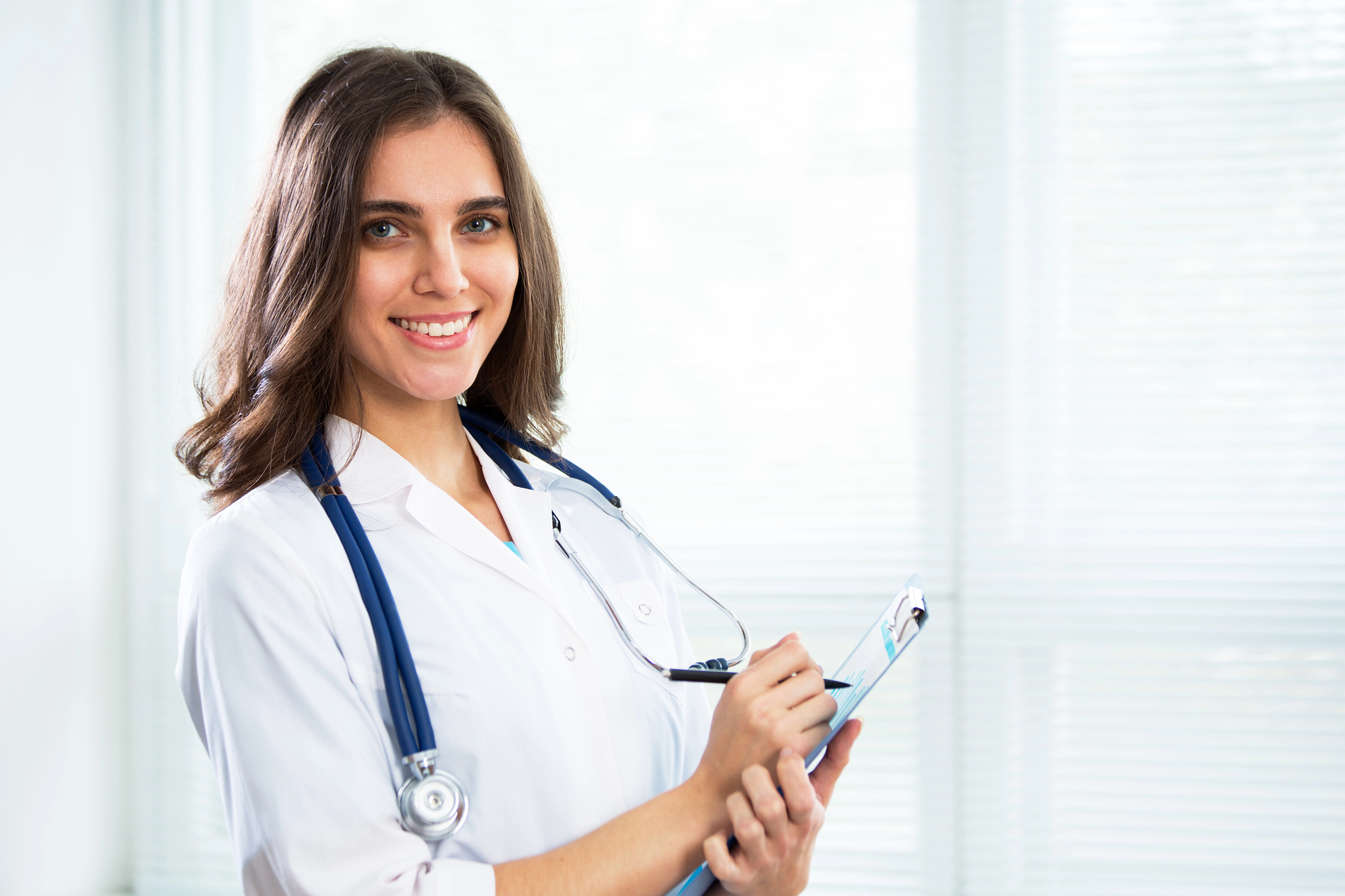 Nurse manager holding a clipboard