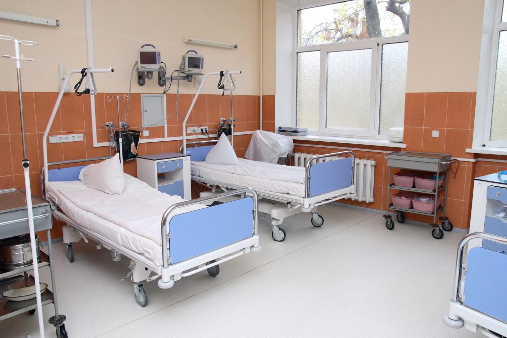 clean hospital room and beds