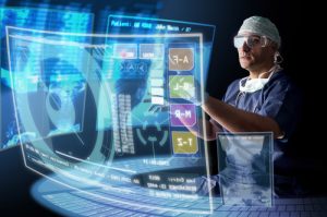 A man at a work station using a futuristic holographic touch screen